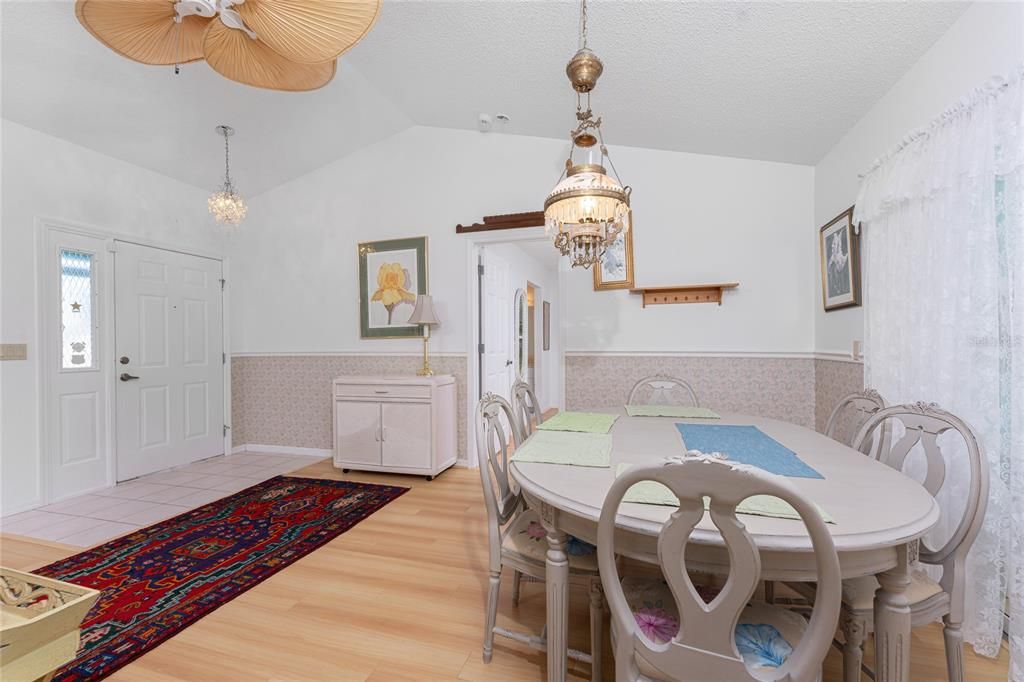 A view of the dining and living area from the front entry way.