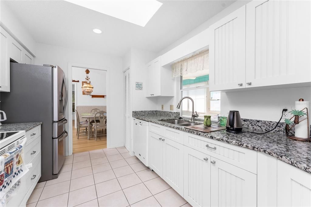 Galley kitchen has plenty of storage.