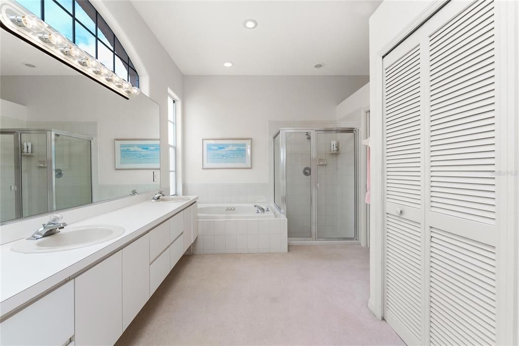 Master bath abd walk-in closet behind the doors to the right.