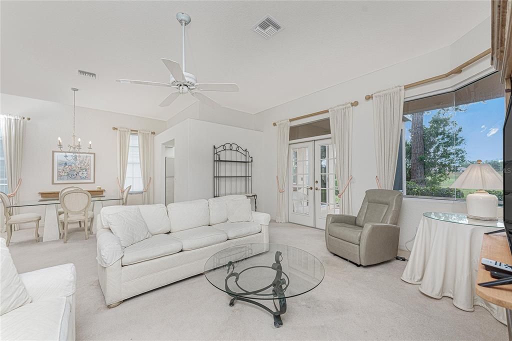 Living room with French doors to the lanai.