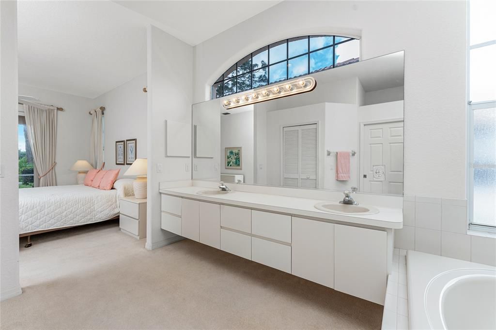 Master bath with a clerestory window providing natural light.