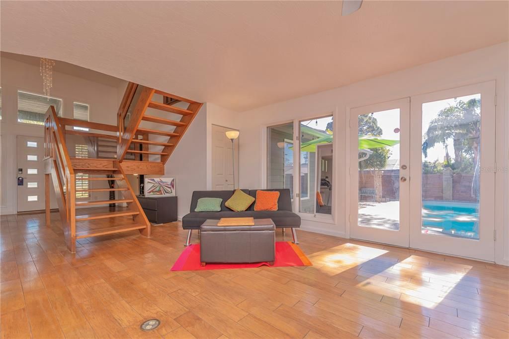 Family room with view to pool lanai.