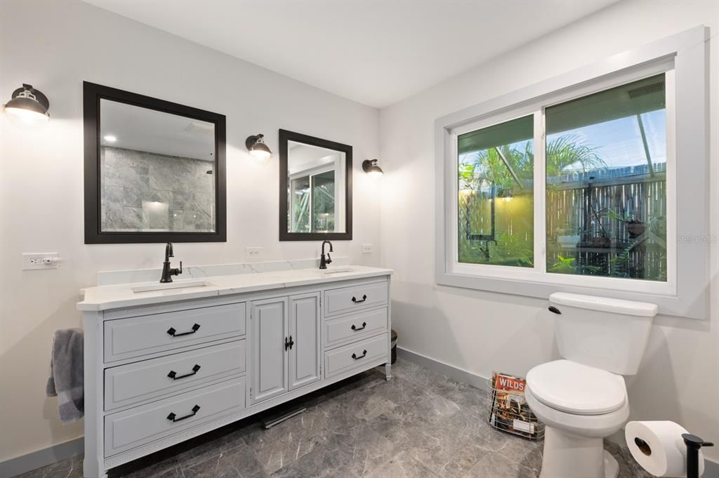 Master bathroom with side garden views