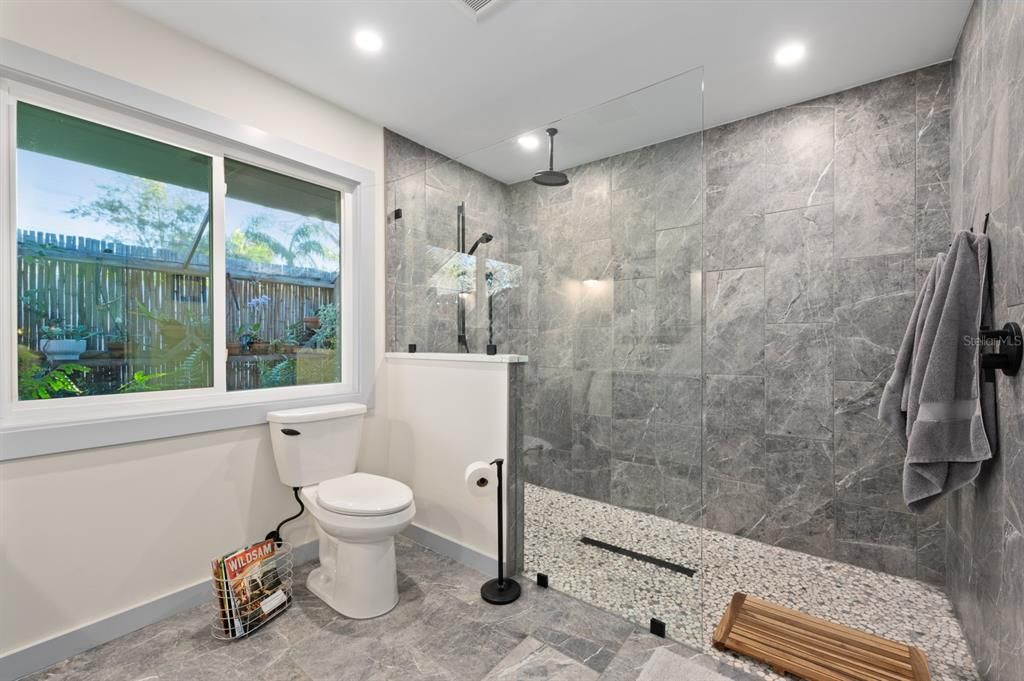 Master bathroom with side garden views