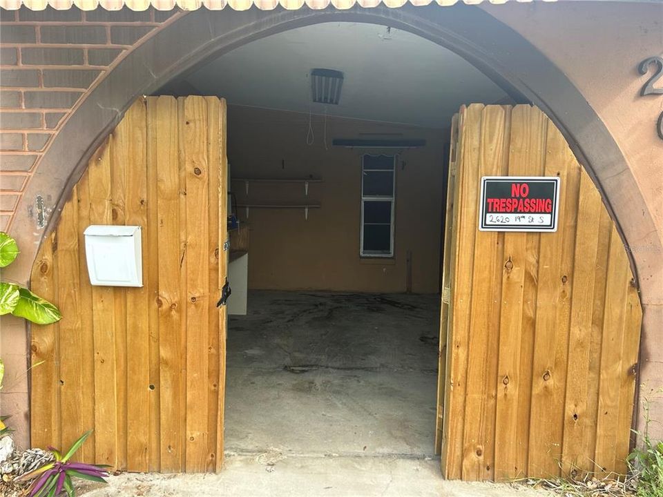 Gate leading to carport