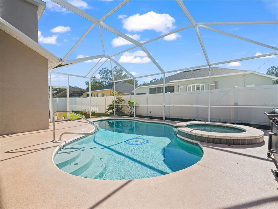 Salt water heated pool with spa