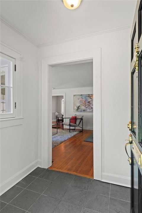 Foyer with slate flooring.