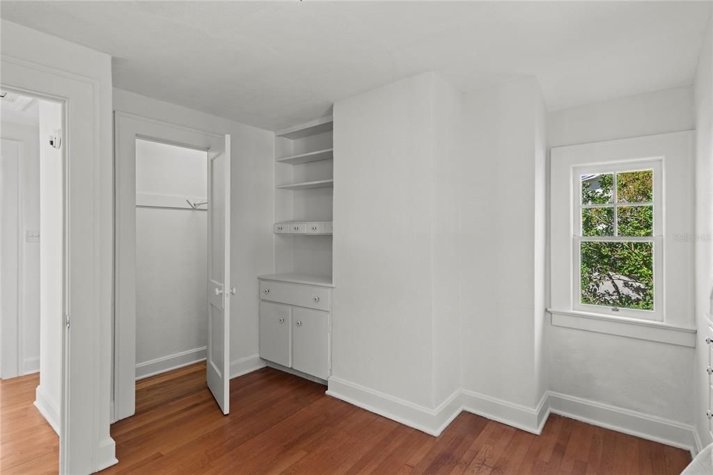 Bedroom 3 built in shelving.