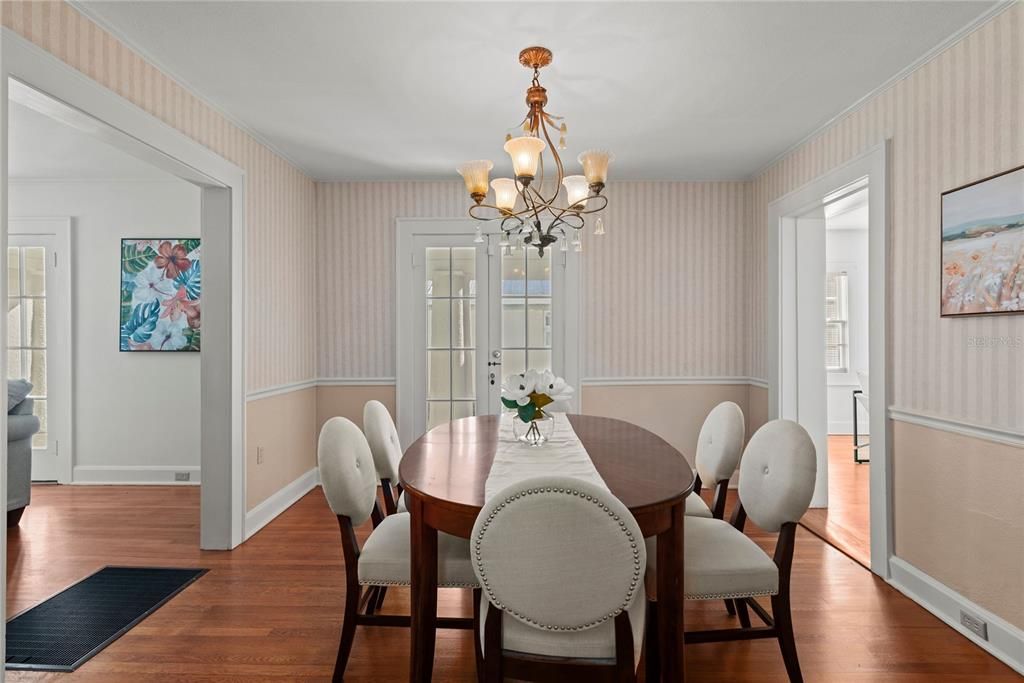 Dining Room leads to the living room and kitchen.