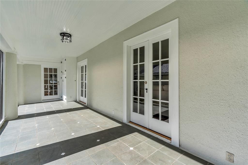 French doors leading to the living room and dining room.