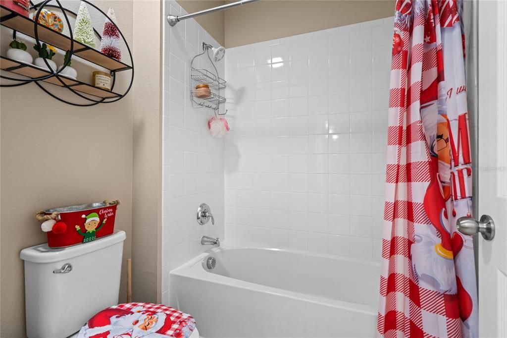 2nd Bathroom has a tub and shower combo.