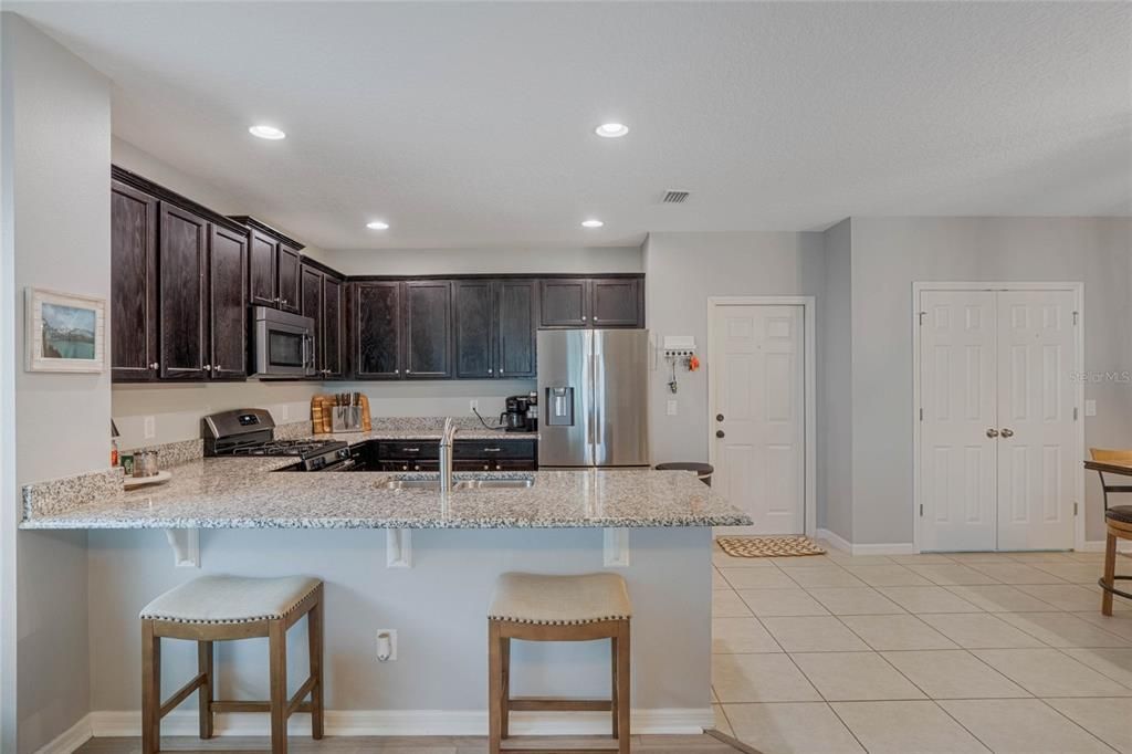 Kitchen offers a sitting great for family gatherings.