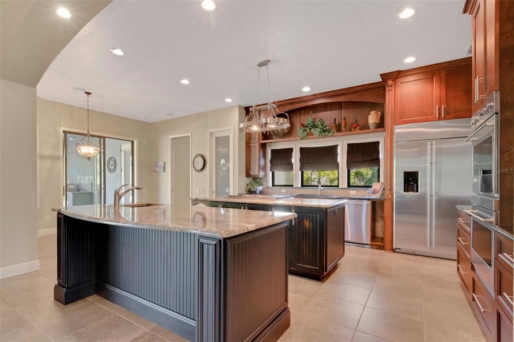 The sliding glass doors exit on to the pool patio area