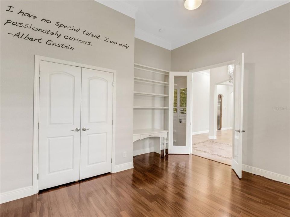 The office is large  ,has a great closet ,plenty of storage along with a built-in desk and shelving.