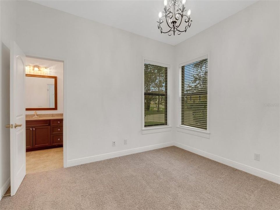 Bedroom #3 and its entry in its private vanity area