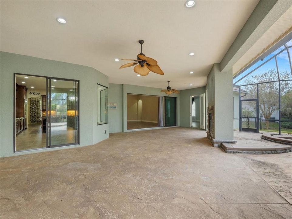 Many of the rooms in this lovely home have  views of the pool.