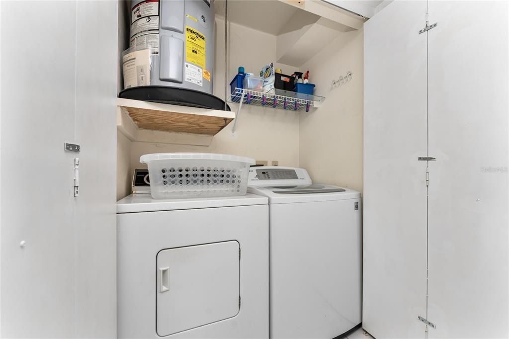 Full size washer and dryer are in the laundry closet.