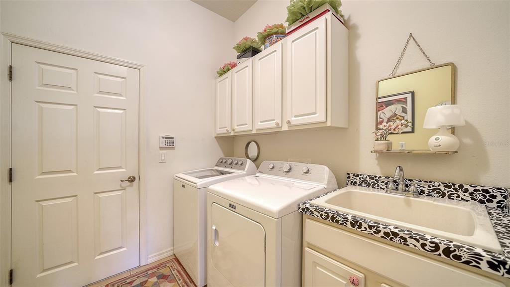 Laundry room exits to 3 car garage