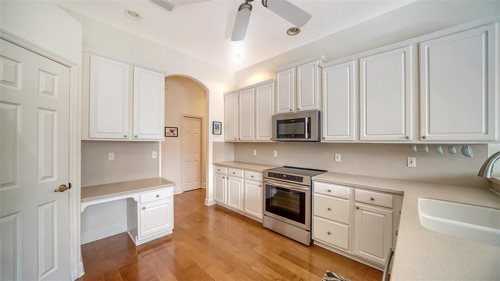 Kitchen with desk and pantry