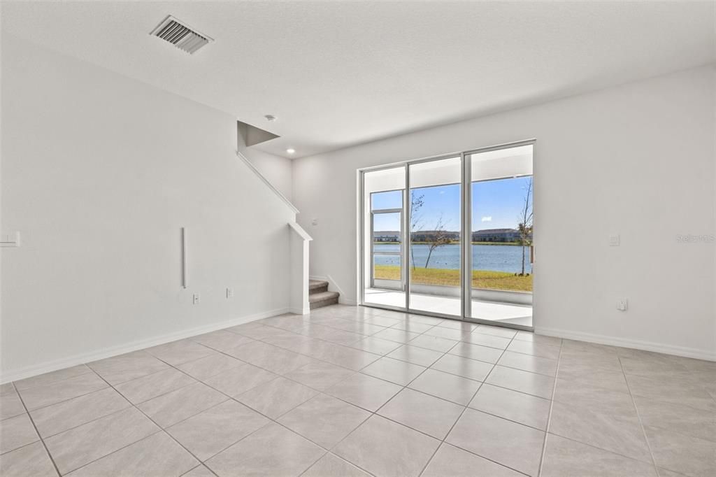 Spacious Living Room with Patio and Pond Views!