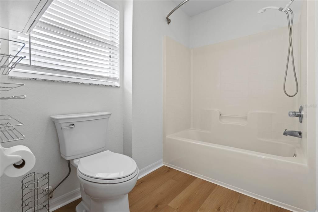 Primary Bathroom with Shower Tub Combo