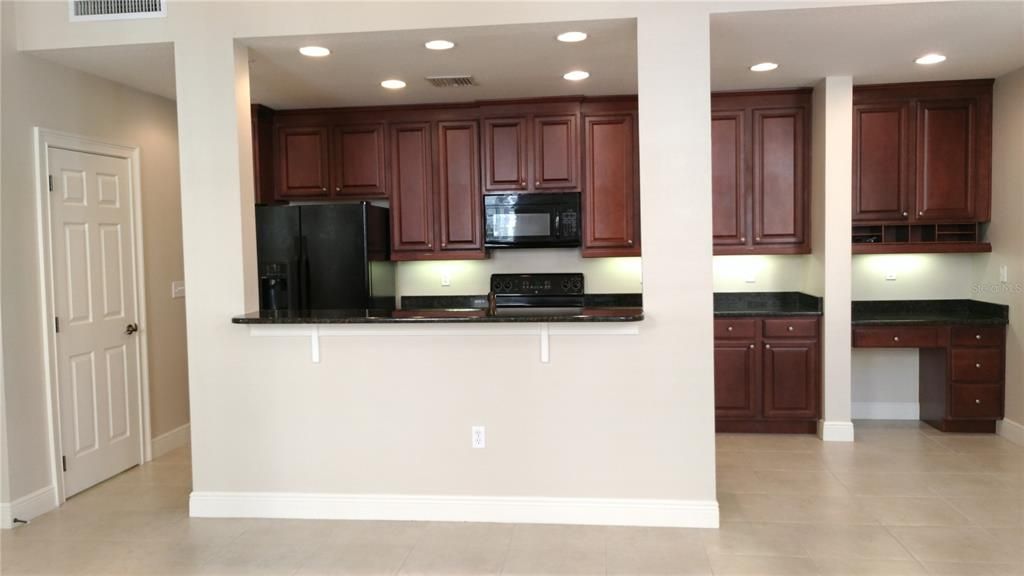 Large kitchen with addition desk area - the is the heart of the home!