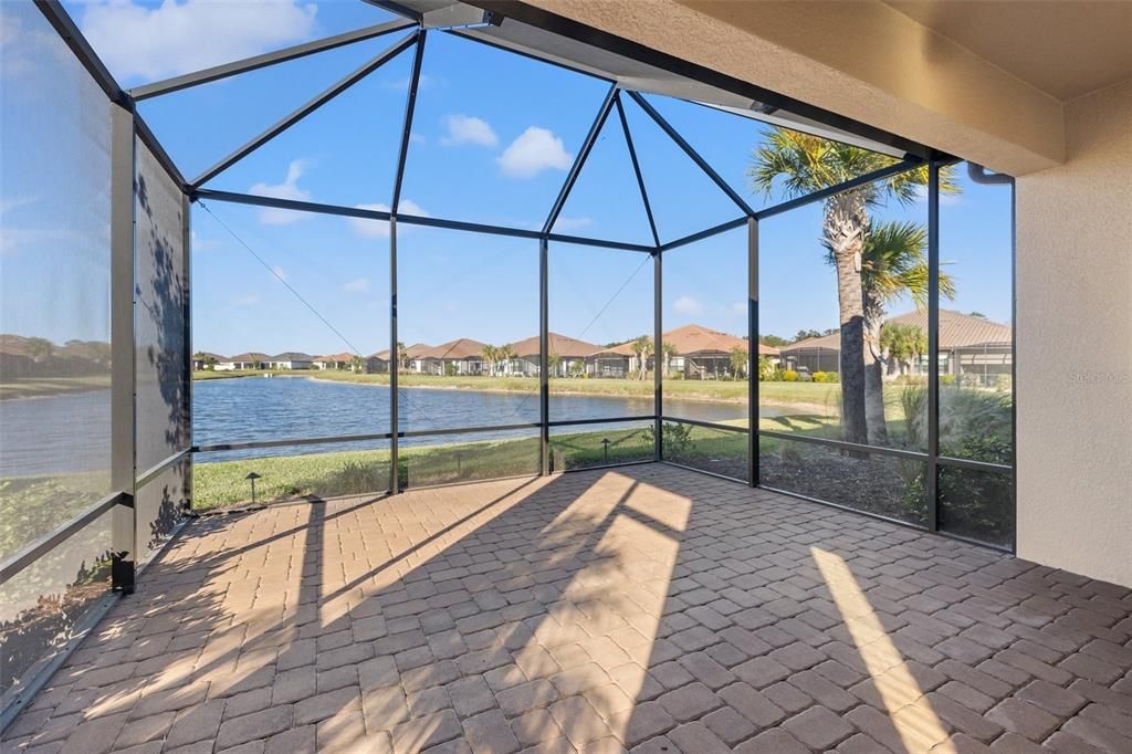 Extended screened lanai with brick pavers