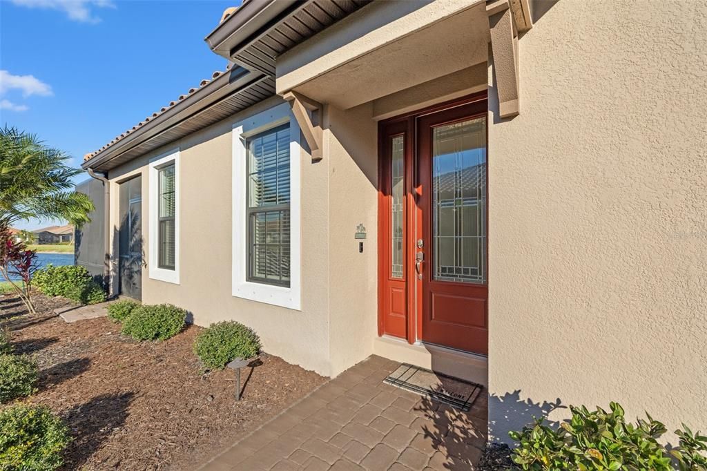 Front entry with hurricane impact glass