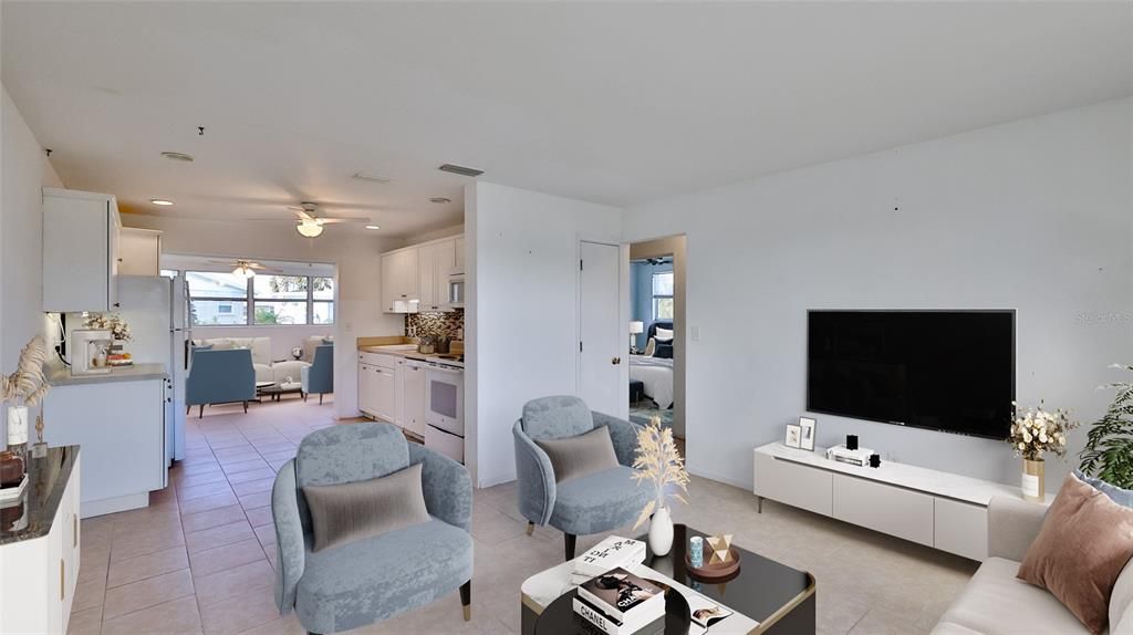 Open Floor Plan! Living room leading to kitchen and Florida Room