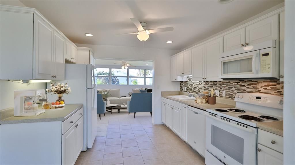 Remodeled Kitchen looking into Florida Room