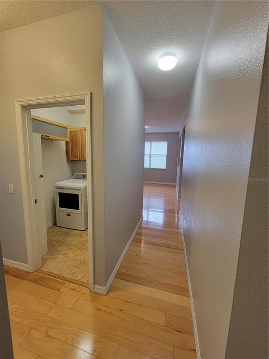 Hallway to bedrooms and laundry