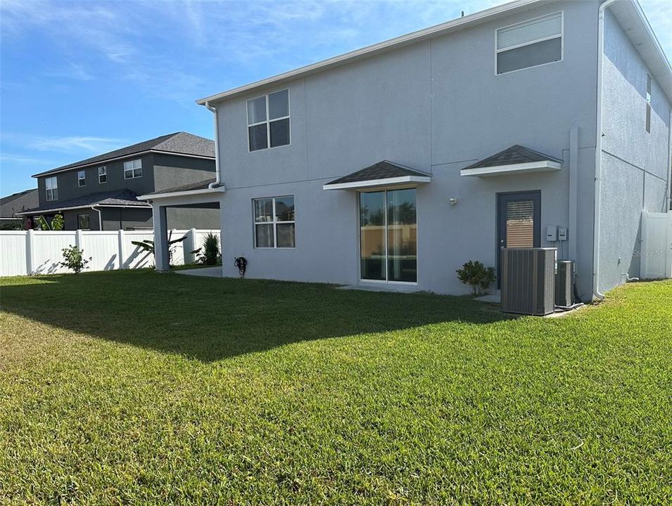 Large, fully fenced backyard