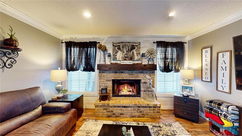 Family Room w/ wood burning fireplace