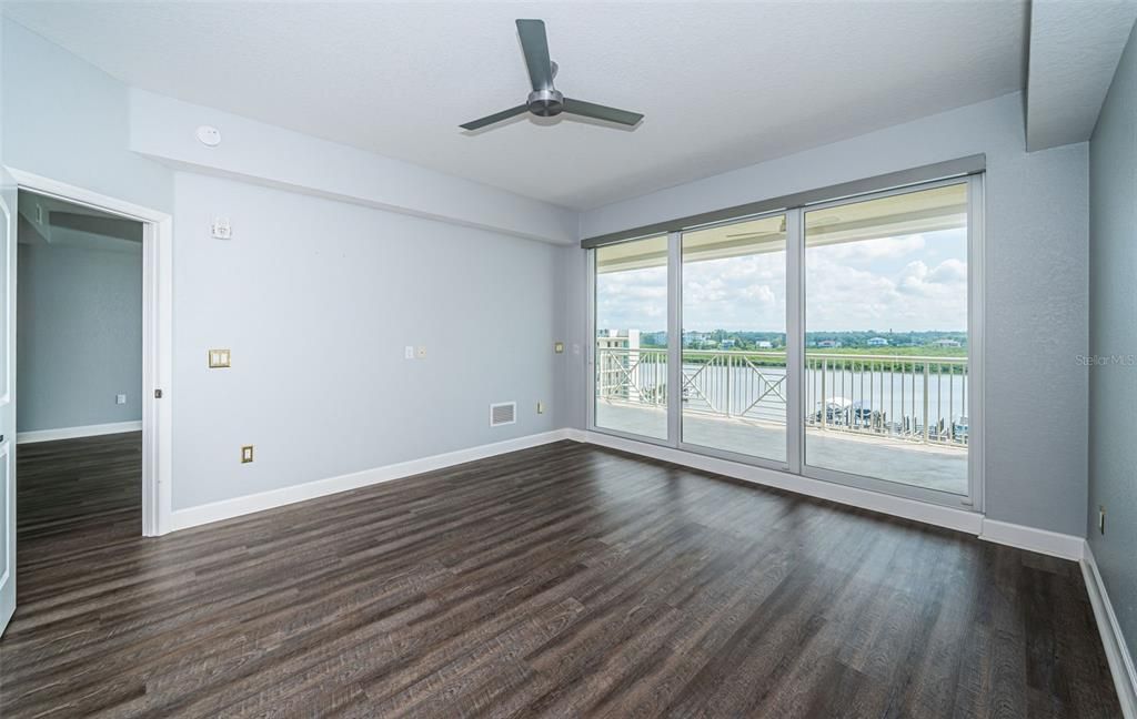 Large Primary Bedroom with Impact Sliders to the Balcony