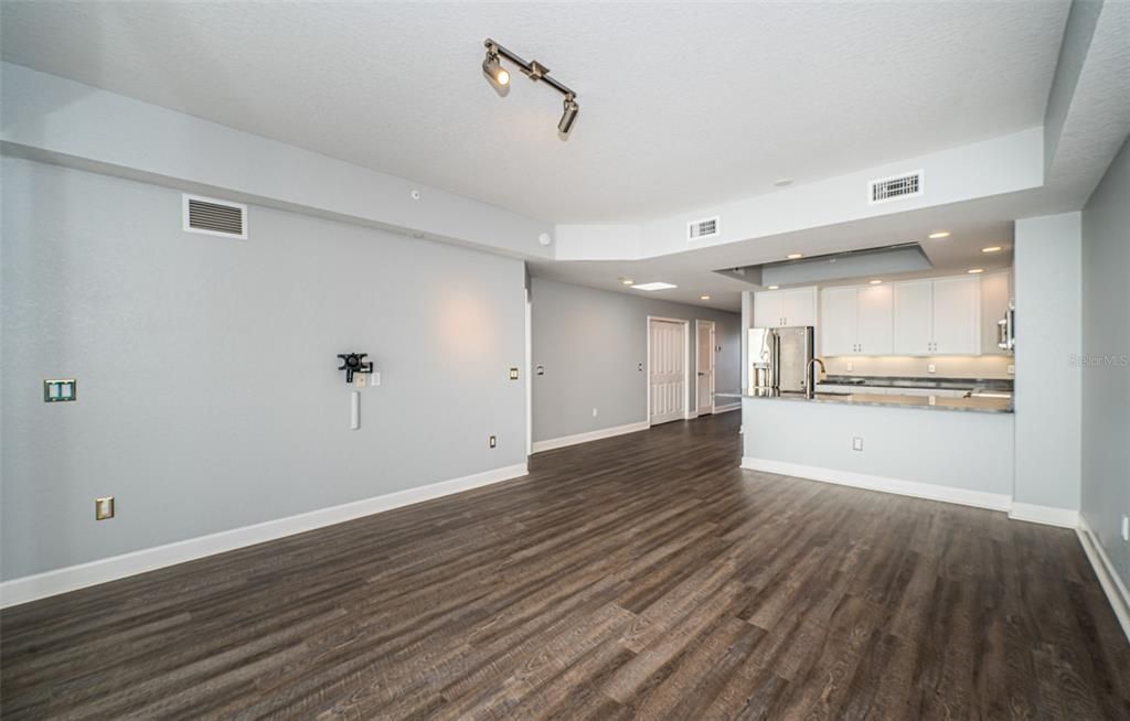 Looking back into the Kitchen with Breakfast bar and Dining area