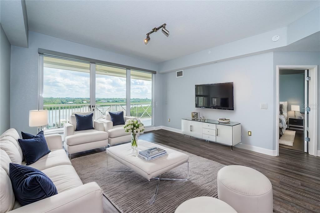 Virtually Staged Living Room with Sliders to the Balcony