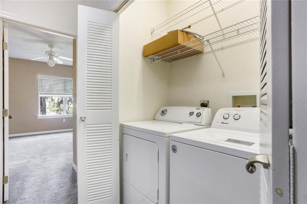 Laundry closet between two bedrooms upstairs.