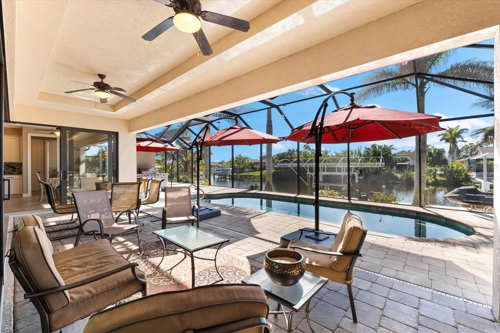 Enjoy Pool and Canal Views from the Lanai