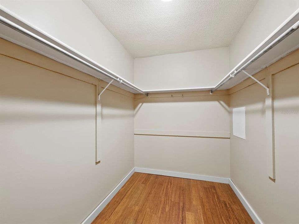 The large walk-in closet of the primary bedroom