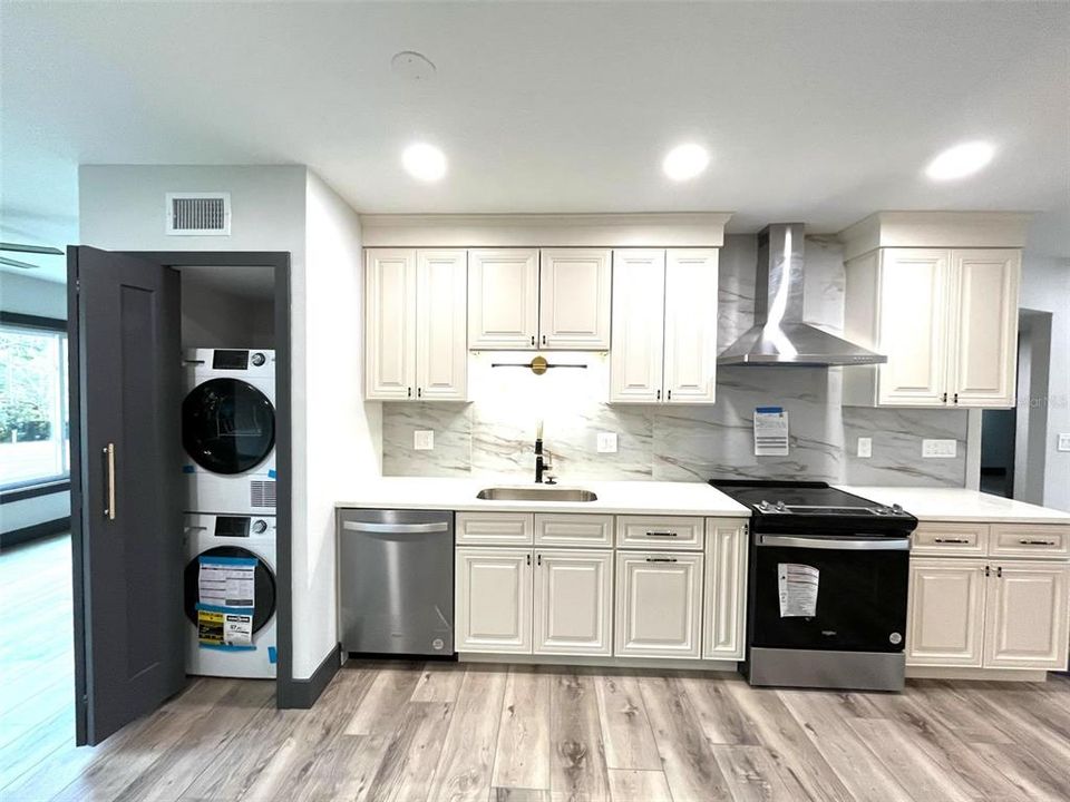 Kitchen 4 - View into Laundry Closet