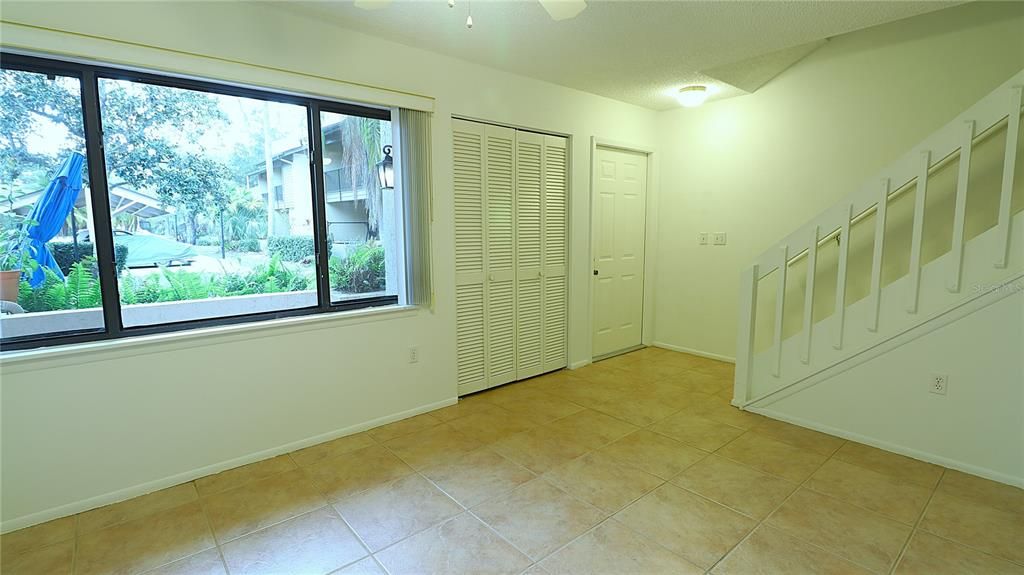 Dining room, closet, front door, stairs