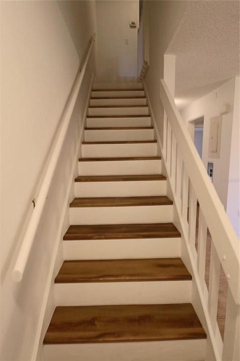 The stairs, and bedrooms have new, luxury vinyl floor boards.