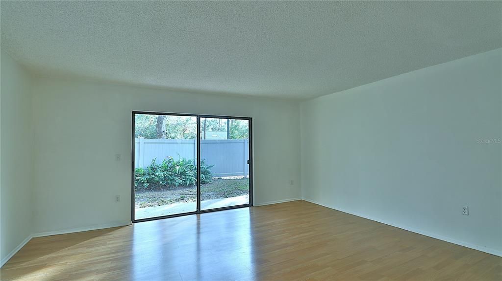 Living room. Note the sliding doors giving access to the patio.