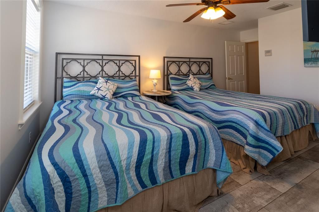 Third floor family room with wet bar