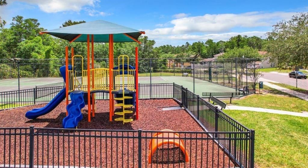 2ND PLAYGROUND BY TENNIS COURTS IN FRONT OF COMMUNITY