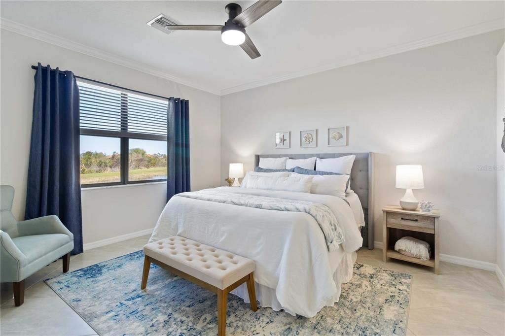 Master bedroom with preserve and water views