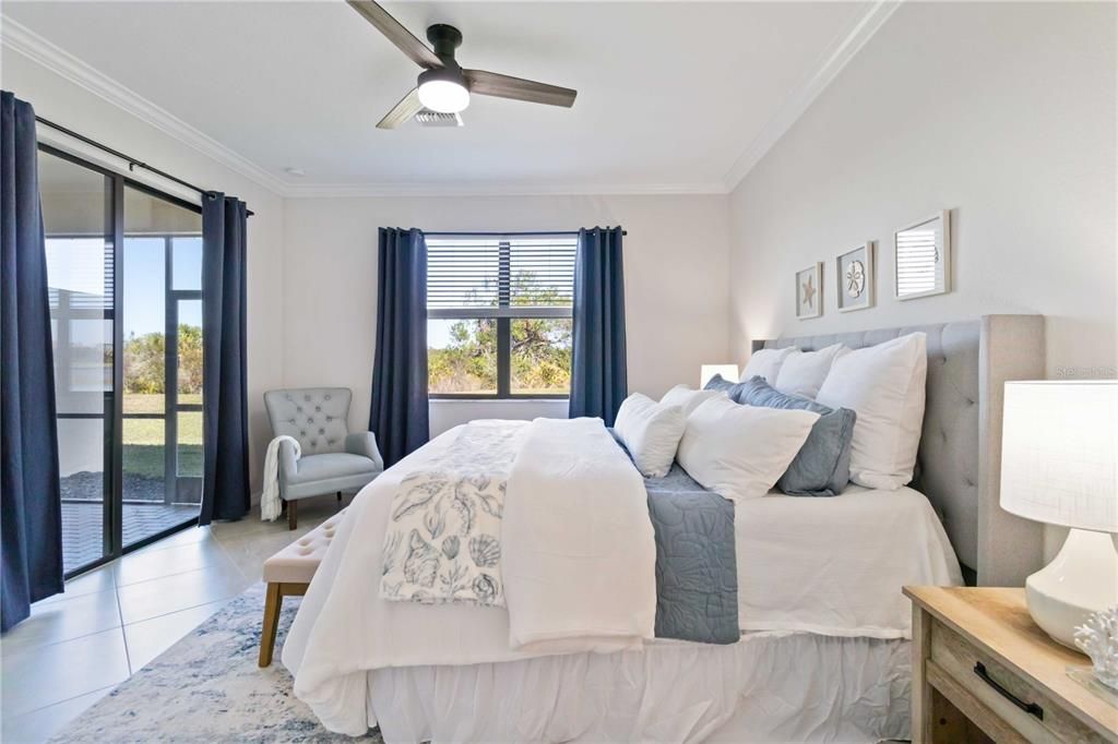 Sliders in master bedroom leading out to lanai