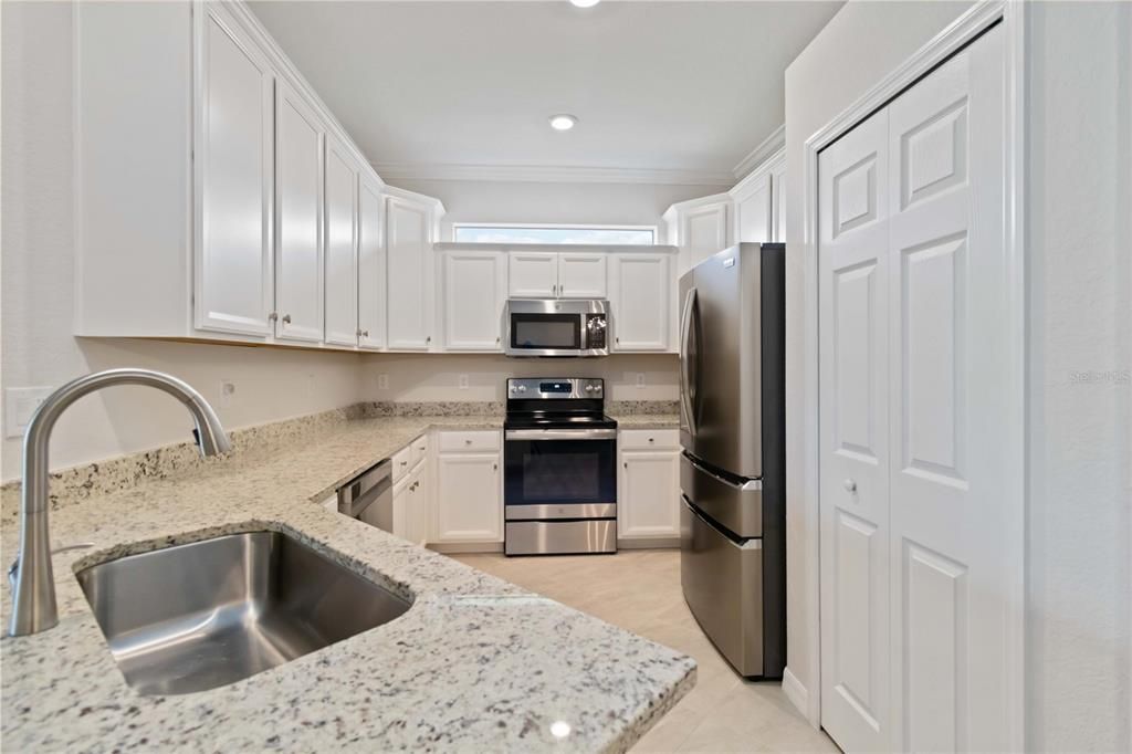 Upgraded stainless steel appliances and plenty of counter space