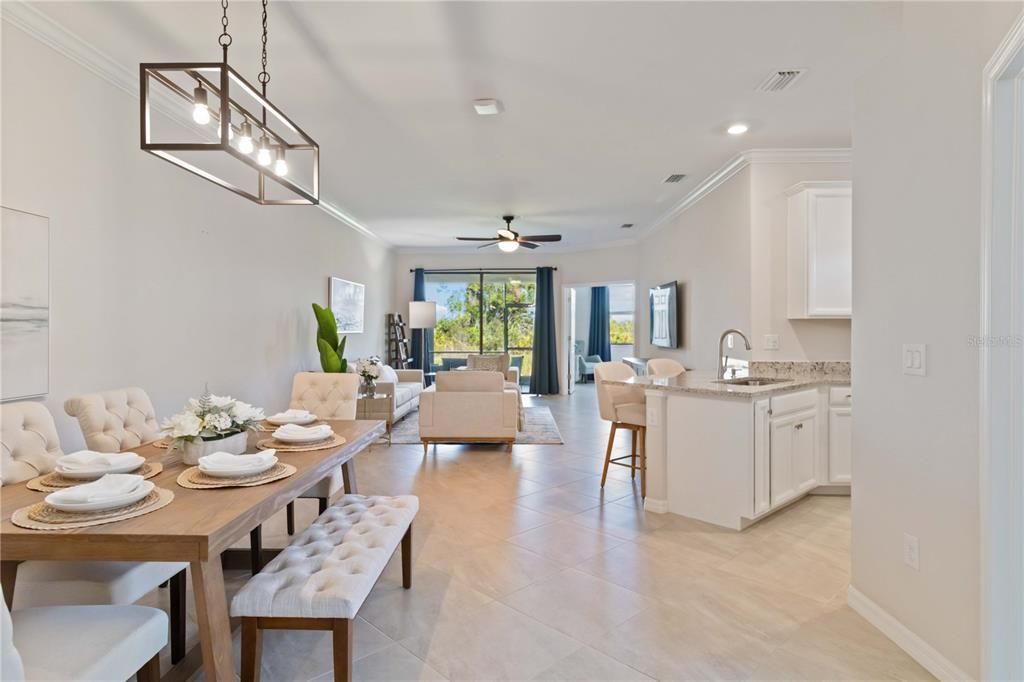 Open concept design with tile flooring throughout