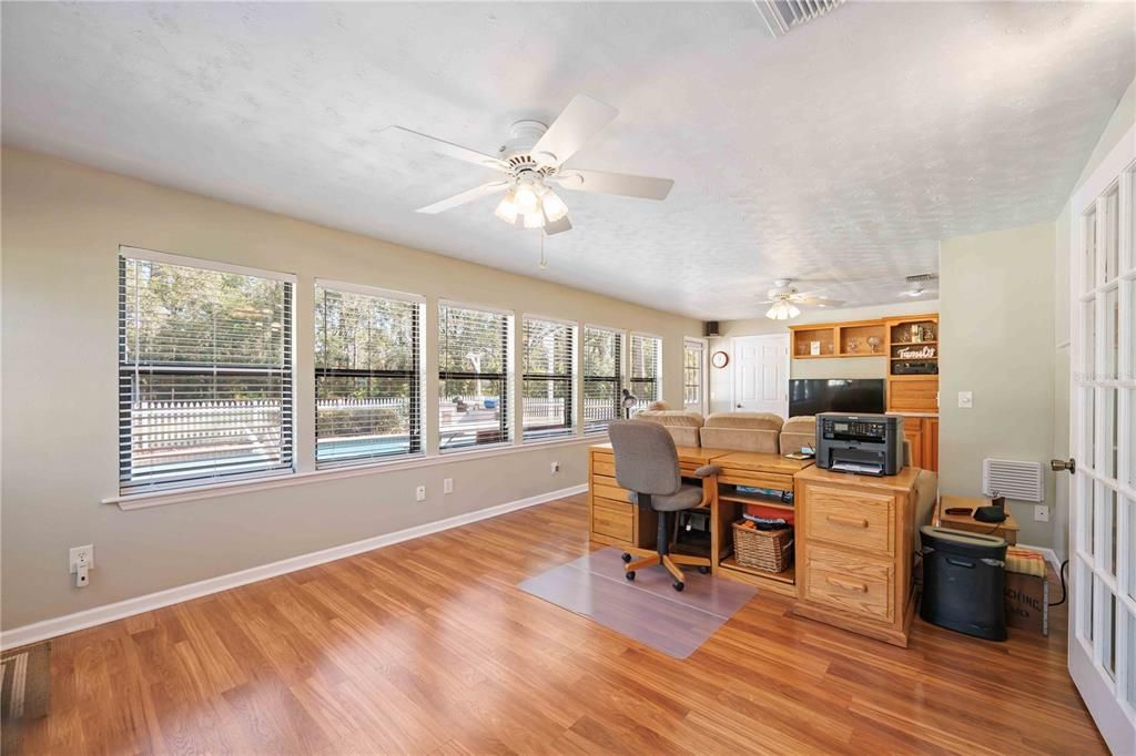 Large Family Room, play room, pool room-whatever you choose to call it! Seller currently uses a portion as an office and TV room